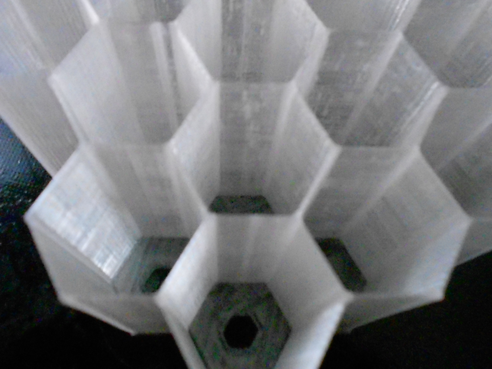 HEX BOX from top, you see holes in the bottom of each slot