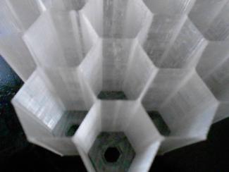 HEX BOX from top, you see holes in the bottom of each slot